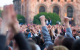 Crowd gathered during a large public demonstration.